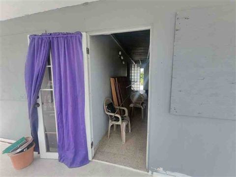 Entrada de la unidad del segundo nivel desde el balcón